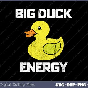 May include: A black and white graphic design with the text "BIG DUCK ENERGY" in white. A yellow rubber duck with a textured surface is in the center of the design.