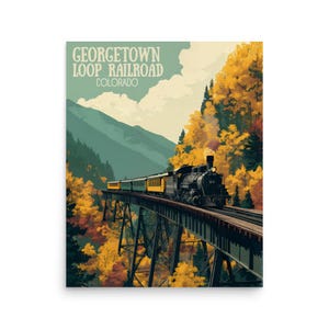 Peut inclure: Une affiche vintage représentant un train à vapeur noir traversant un pont. Le texte "Georgetown Loop Railroad Colorado" est en haut. L'arrière-plan montre des montagnes et des arbres aux couleurs automnales.