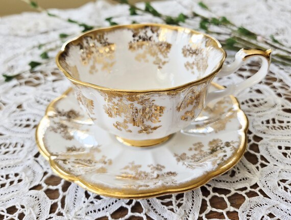 Mid century Royal Albert gold chintz teacup and saucer set