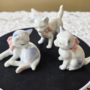 Vintage ceramic cat figurine trio