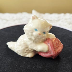 Adorable vintage kitten with yarn glazed ceramic figurine