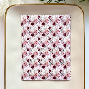 May include: A set of three ceramic mugs with a speckled, matte finish. The mugs are in shades of cream, light gray, and dark gray. Each mug has a simple, minimalist design, perfect for coffee or tea.