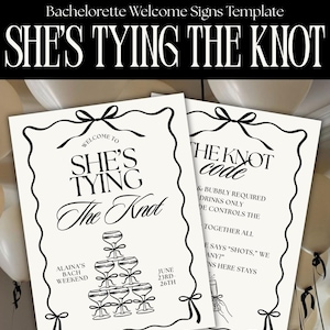 May include: Two white welcome signs with black text and decorative borders. The signs read "She's Tying the Knot" and include details for a bachelorette weekend. The signs are surrounded by white balloons.