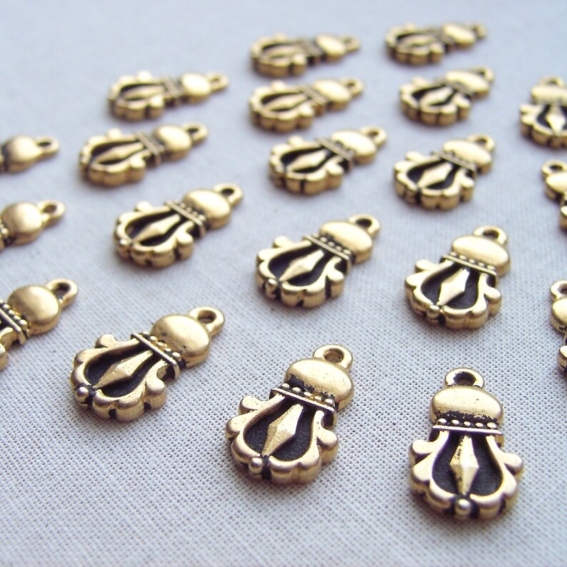 Tibetan Dorje 20 pcs TierraCast Buddhist Charm Antique Gold Finish Ethnic Charm 94-2044