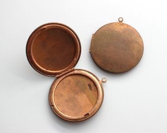 Par de relicarios antiguos de cobre oxidado de 38 mm
