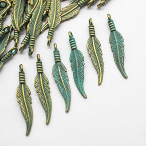 8 Antique Bronze Green Patina Feather Charms 6x31mm