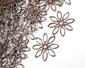 12 vintage Rusty Steel Flower Findings 24mm