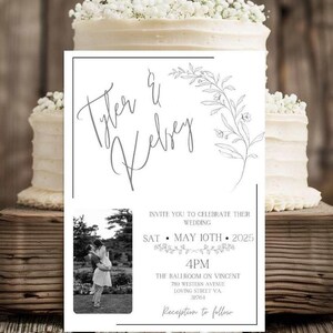 May include: A black and white wedding invitation with a floral design and a photo of a couple. The invitation includes the couple's names, the date and time of the wedding, and the location. The text reads "Tyler & Kelsey Invite you to celebrate their wedding Sat May 10th 2025 4PM The Ballroom on Vincent 780 Western Avenue Loving Street VA. 32764 Reception to follow"