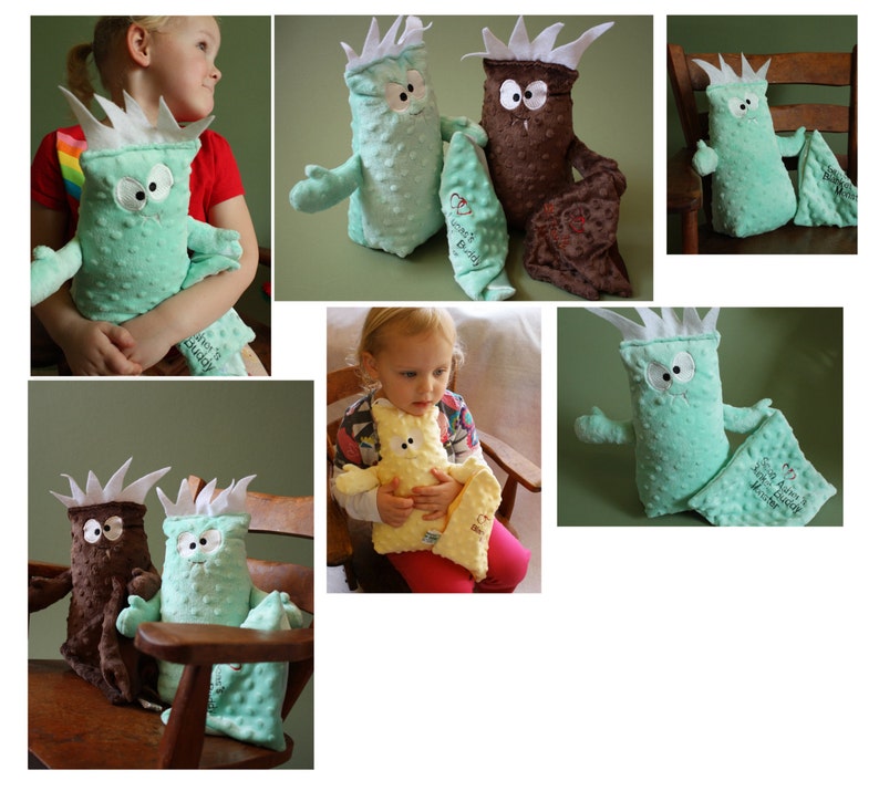 May include: A set of four plush toys in the shape of monsters. The toys are green and brown and have embroidered eyes and mouths. The toys are all different sizes and have different expressions on their faces. The toys are all lying on a wooden surface.