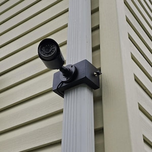 Wireless Security Camera Mount for Gutters – Reinforced, Adjustable, No-Drill, 1-Year Warranty – Fits Blink,Arlo,Eufy,Wyze.