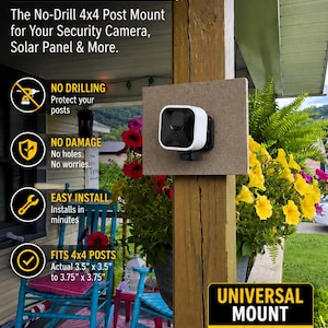 May include: A no-drill 4x4 post mount for security cameras and solar panels. The mount is attached to a wooden post and features text stating: NO DRILLING. NO DAMAGE. JUST SECURE. Fits 4x4 posts measuring 3.5 inches by 3.5 inches to 3.75 inches by 3.75 inches.