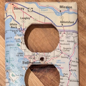 Placas de interruptores de luz y cubiertas de enchufes con mapas personalizados