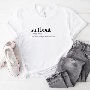 Sailboat. A whole in the water you throw money I Sailing Shirt | Cool Sailing Apparel | Ocean Adventure Tee | Ideal for Sailors and Boaters
