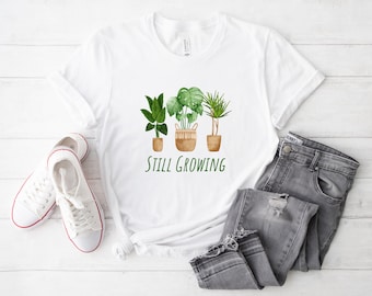 Koszulka „Still Growing Plants”: Unisex Tee na temat zdrowia psychicznego