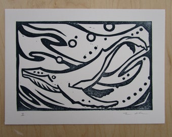 Linocut print of humpback whale