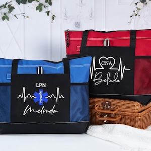 May include: Two tote bags, one blue and one red, with black accents. The blue bag has "LPN" and a medical symbol, with the name "Melinda". The red bag has "CNA" and a heartbeat design, with the name "Belinda".
