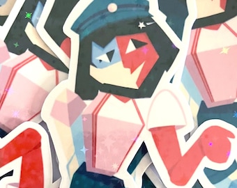 May include: A sticker featuring a cartoon character with a blue and red face, wearing a blue and white hat, a pink and white shirt, and a blue skirt. The character has a white star on their forehead and a white star on their hat.
