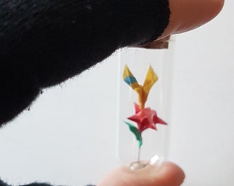 Hummingbird on a flower origami pendant