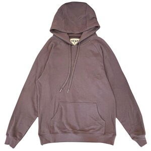 May include: A solid mauve hoodie with a drawstring hood and a kangaroo pocket. The hoodie has long sleeves and a tag that reads "HEMP". The garment is made of a soft material.
