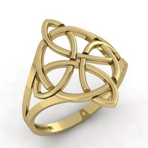 May include: A gold-colored ring featuring a Celtic knot design. The ring has a band and an openwork knot centerpiece. The knot is made of interwoven lines, creating a symmetrical pattern. The ring is likely made of metal.