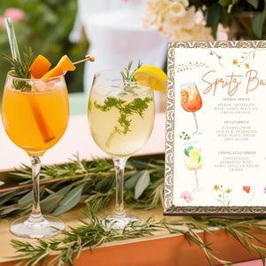 16x20" Spritz Bar Sign framed and set up at a summer garden party