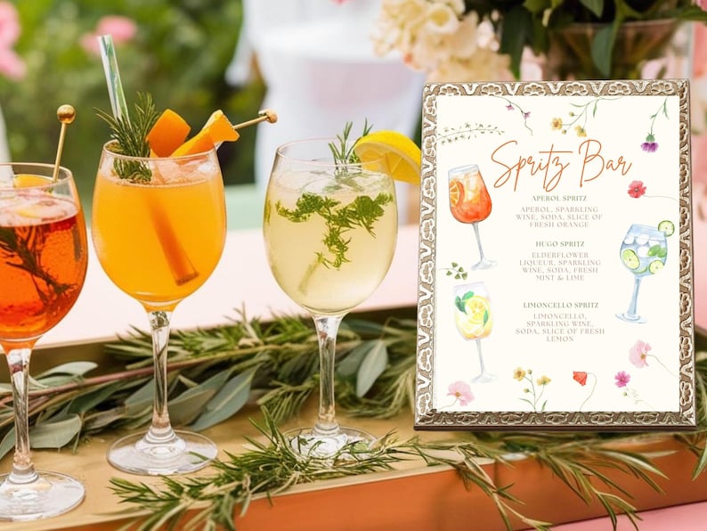 16x20" Spritz Bar Sign framed and set up at a summer garden party
