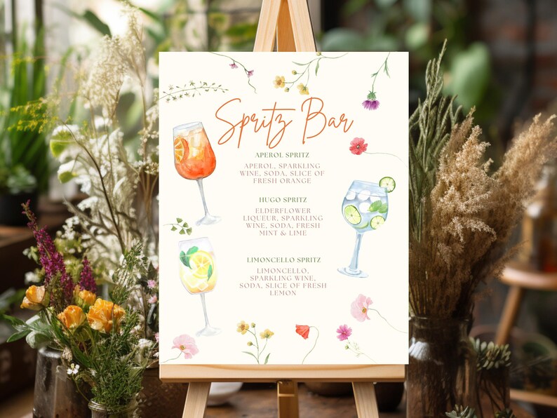 Printable Spritz Bar Sign featuring Aperol, Hugo, and Limoncello cocktails with watercolor floral border