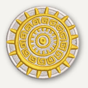 May include: A circular embroidered patch featuring a bright yellow sun-like design with a central dot, concentric rings, and a Greek key pattern. The outer edge is adorned with yellow spikes, all set against a white stitched background.