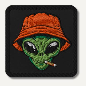 Alien Head Patch – Smoking Extraterrestrial in Orange Bucket Hat