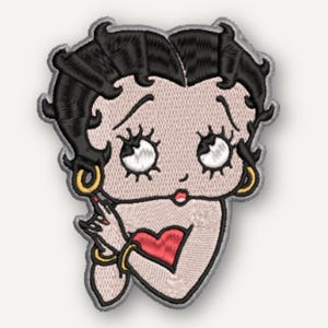 Può includere: Una toppa ricamata raffigurante la testa e le spalle di un personaggio dei cartoni animati con capelli neri, occhi grandi, orecchini a cerchio dorati e rossetto rosso. Il personaggio tiene una mano vicino al mento, indossa braccialetti dorati e un cuore rosso.