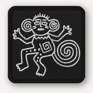 May include: Embroidered patch with a white, stylized figure on a black square. The figure resembles a monkey with spiral ears, outstretched arms, and a curled tail. The design is detailed with embroidered lines.