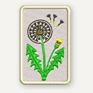 May include: A rectangular embroidered patch featuring a white background with a green-stemmed dandelion plant. The design includes a black and white seed head, a yellow flower bud, and three floating black seeds with yellow tips, all bordered in cream.