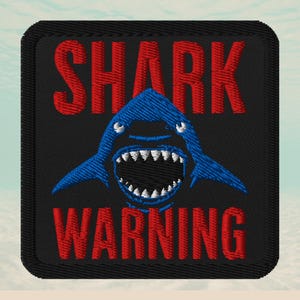 Haaienpatch: op kaken geïnspireerd borduurwerk - opstrijkbaar voor jassen