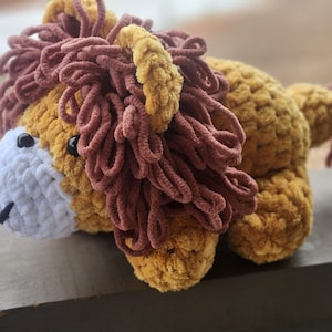Cuddle King: A Lying Lion Plush Crochet Pattern