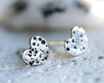 Small heart stud earrings, textured silver and patinated