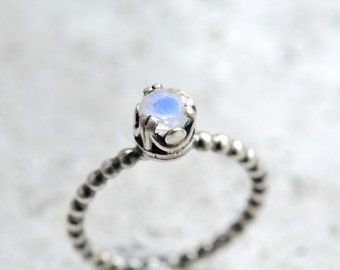 Rainbow moonstone ring. Sterling silver ring with faceted blue flash moonstone. Made to order