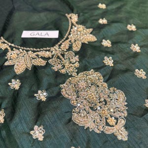 Close-up of intricate embroidery on green sharara suit – ideal Mehndi dress for bride
