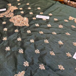 Bridal outfit with net dupatta and plazo-style sharara pants – elegant green wedding wear