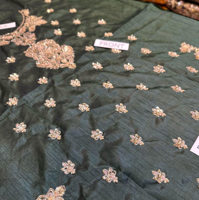 Bridal outfit with net dupatta and plazo-style sharara pants – elegant green wedding wear