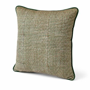 May include: Square decorative pillow with a green and white dot pattern. The pillow has a dark green border. The pattern is a repeating series of small dots in white, green, and red. The pillow is a square shape.