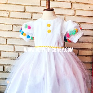 Minnie pom pom dress hotsell