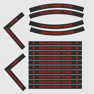 May include: Black and red deployment zone signs and labels. The text "DEPLOYMENT ZONE" is printed in red on black curved and rectangular shapes. Arrows point down on some labels.