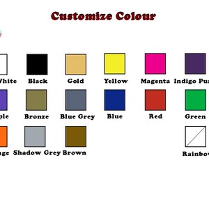 Op de afbeelding: Een kaart met 15 verschillende kleurstalen, waaronder Jade Wit, Zwart, Goud, Geel, Magenta, Indigo Paars, Paars, Brons, Blauwgrijs, Blauw, Rood, Groen, Oranje, Schaduwgrijs en Bruin. De kaart bevat ook een wit vierkant met een diagonale lijn, met de tekst "Regenboog".