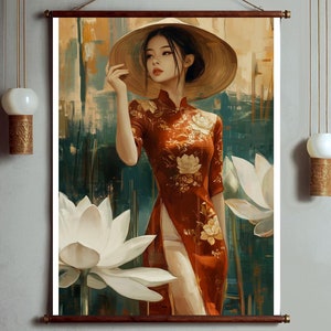 May include: A wall hanging featuring a painting of a woman in a traditional red dress and a conical hat. The artwork includes white lotus flowers and a background with teal and gold tones. The piece is displayed with wooden rods and a hanging cord.