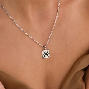 925 sterling silver flower necklace with black uv enamel - barcelona paving stones design