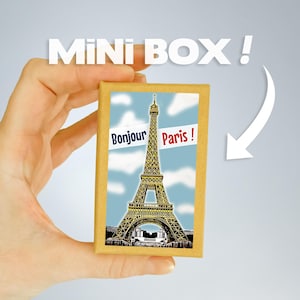 Eine Schachtel mit Paris-Miniaturen für eine Reise in Ihrer Handfläche! „Bonjour Paris!“ Geschenkbox Reiseankündigung oder Souvenir