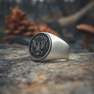 Sterling silver Army ring featuring American eagle with shield and military emblems