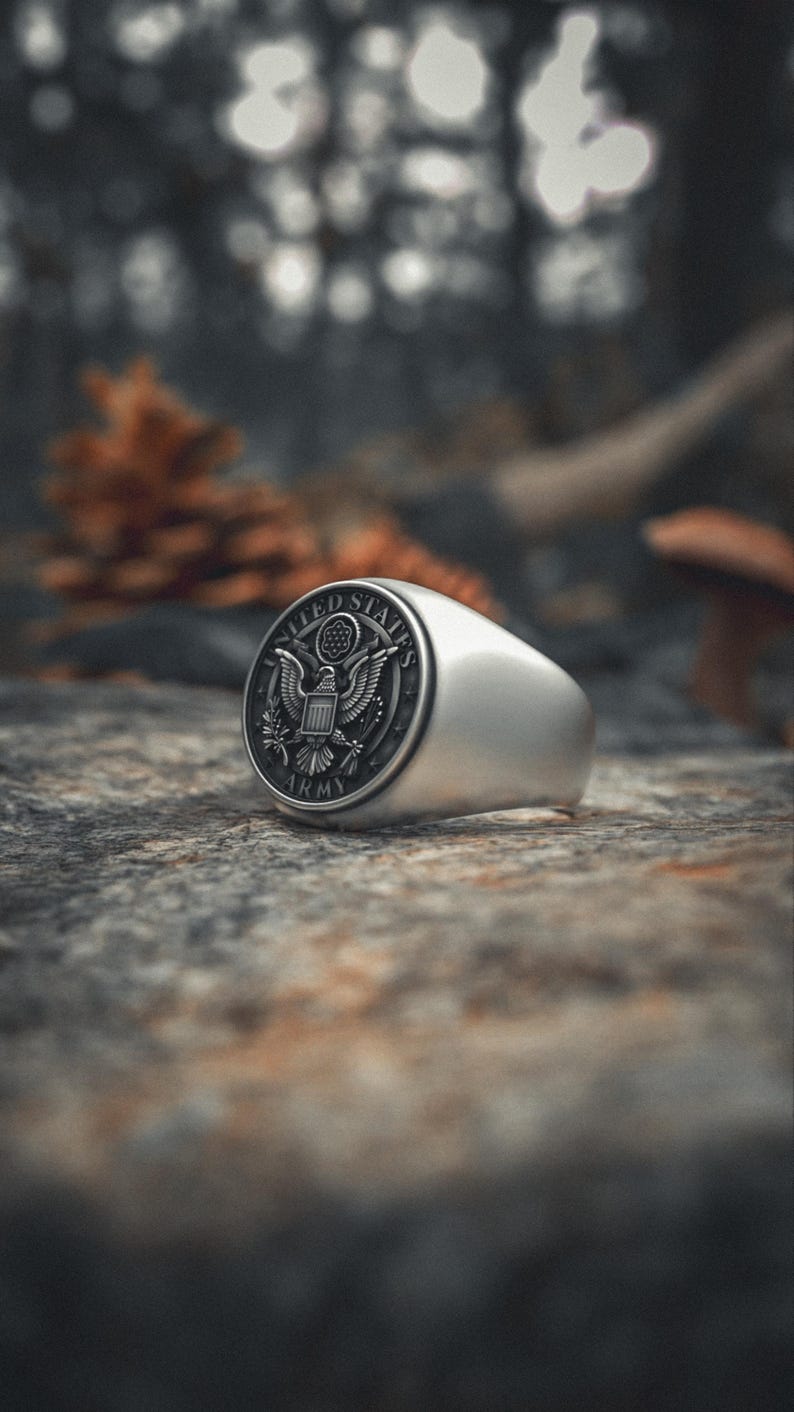 Sterling silver Army ring featuring American eagle with shield and military emblems