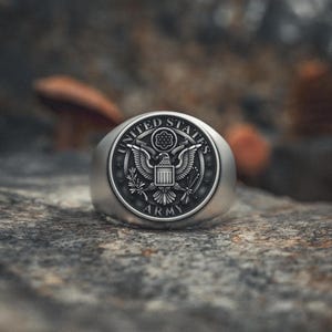 Men's military Army signet ring showing patriotic eagle design in oxidized finish