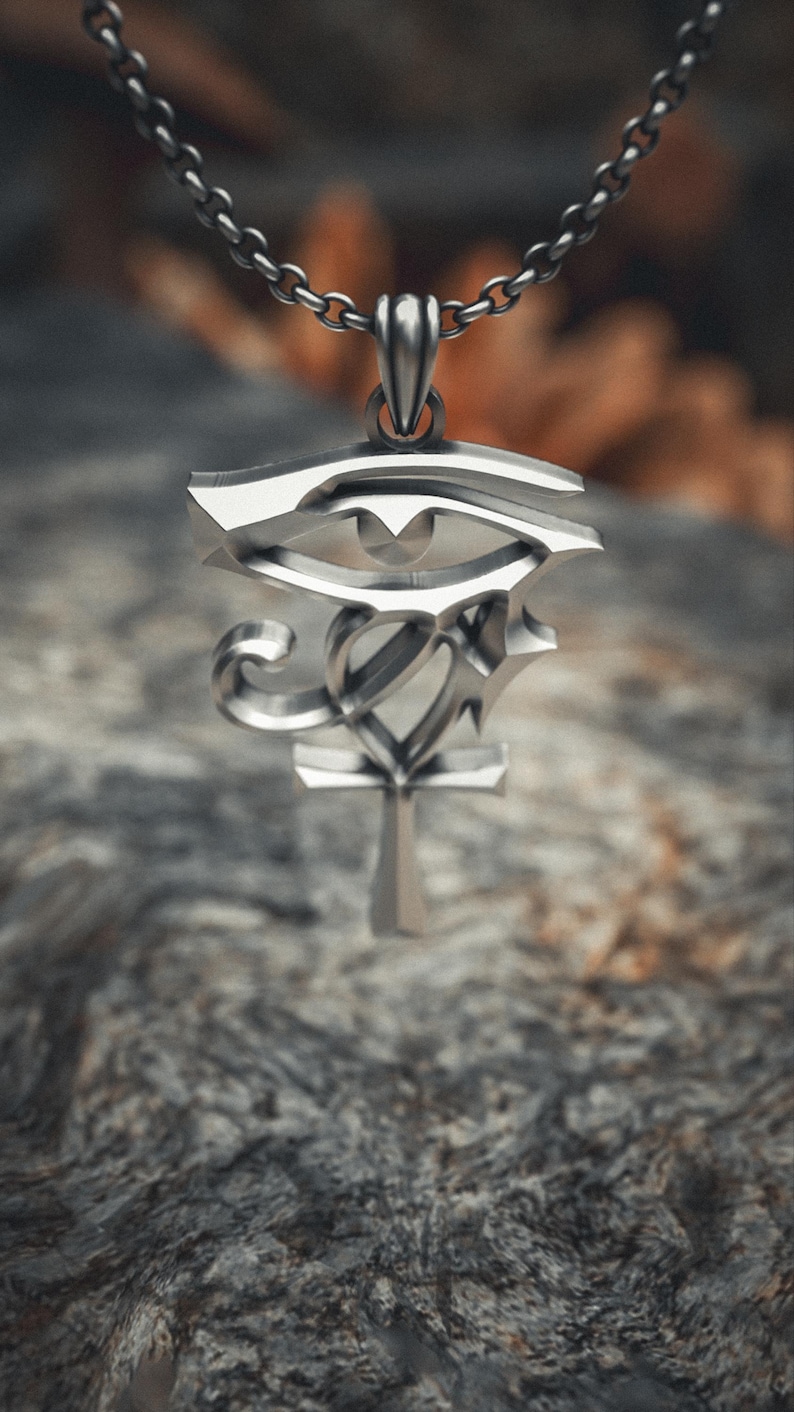 Handcrafted 925 sterling silver Eye of Horus pendant featuring sleek modern design with Ankh symbol on sturdy oxidized chain necklace.